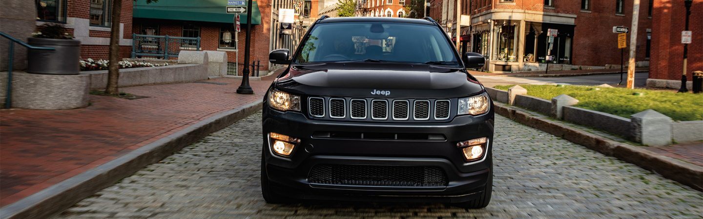 The 2021 Jeep Compass being driven on the city road.